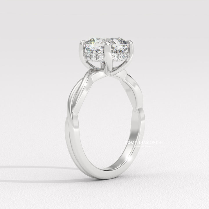 Cushion solitaire lab grown diamond ring fitted on finger