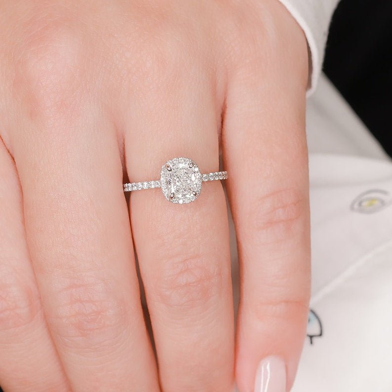 Cushion cut engagement ring side view showing band detail