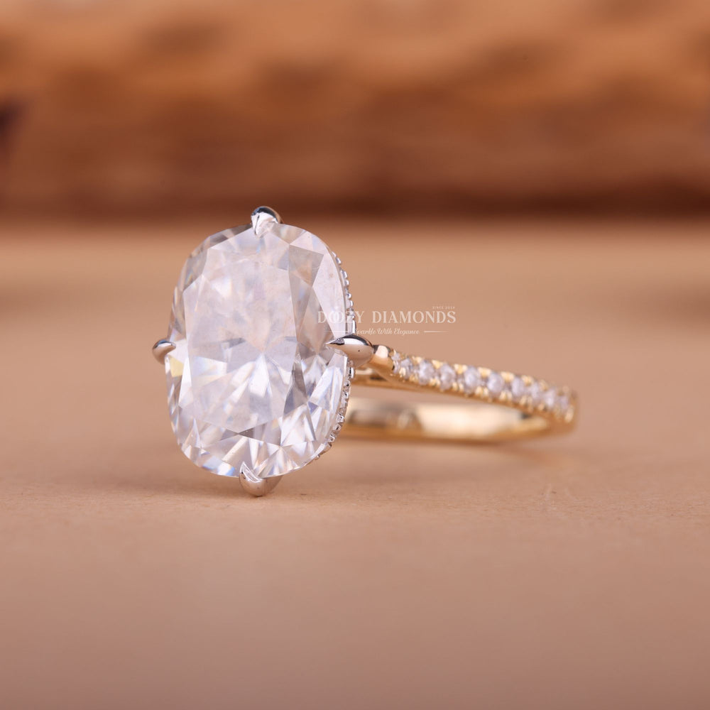 Profile view of cushion cut hidden halo engagement ring band