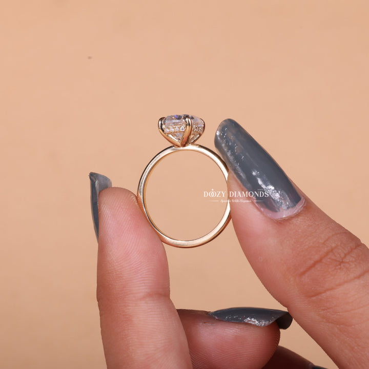 Cushion hidden halo lab grown diamond ring fitted on finger