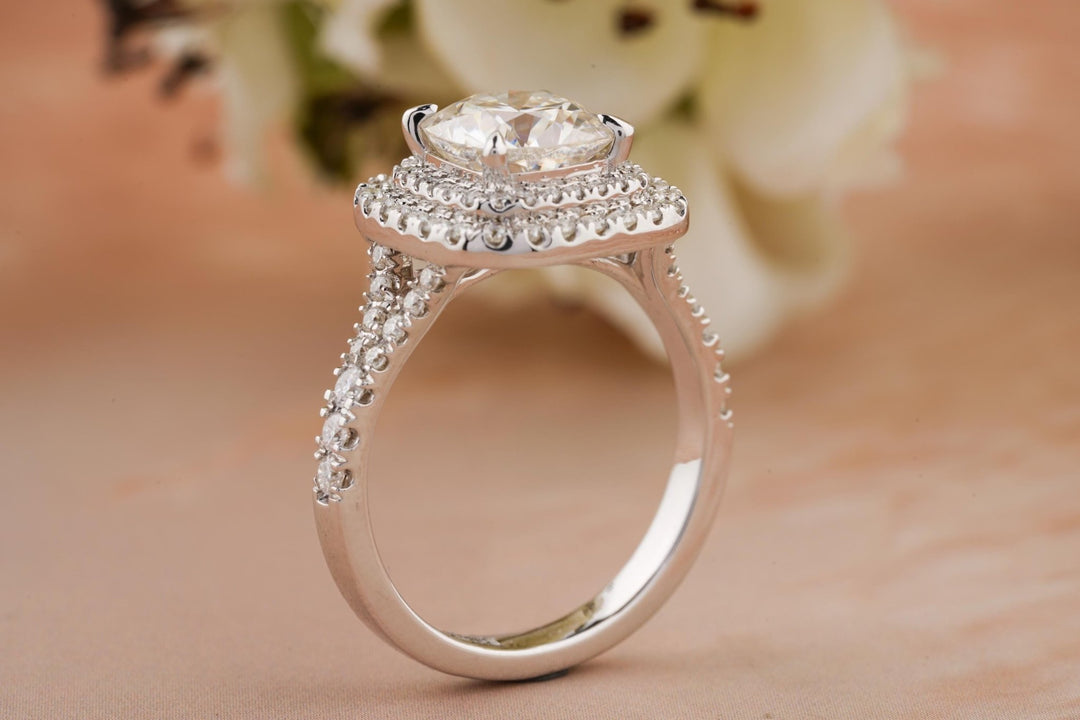 Cushion halo diamond ring presented in signature gift packaging