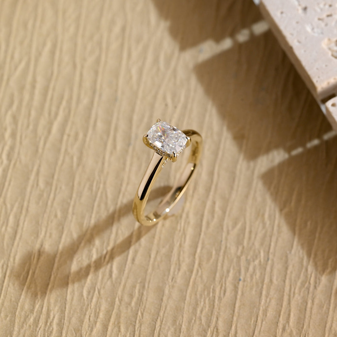 Cushion cut hidden halo engagement ring shown in real-life wear