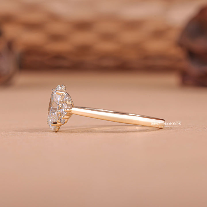 IGI certified oval cut diamond in cluster engagement ring setting