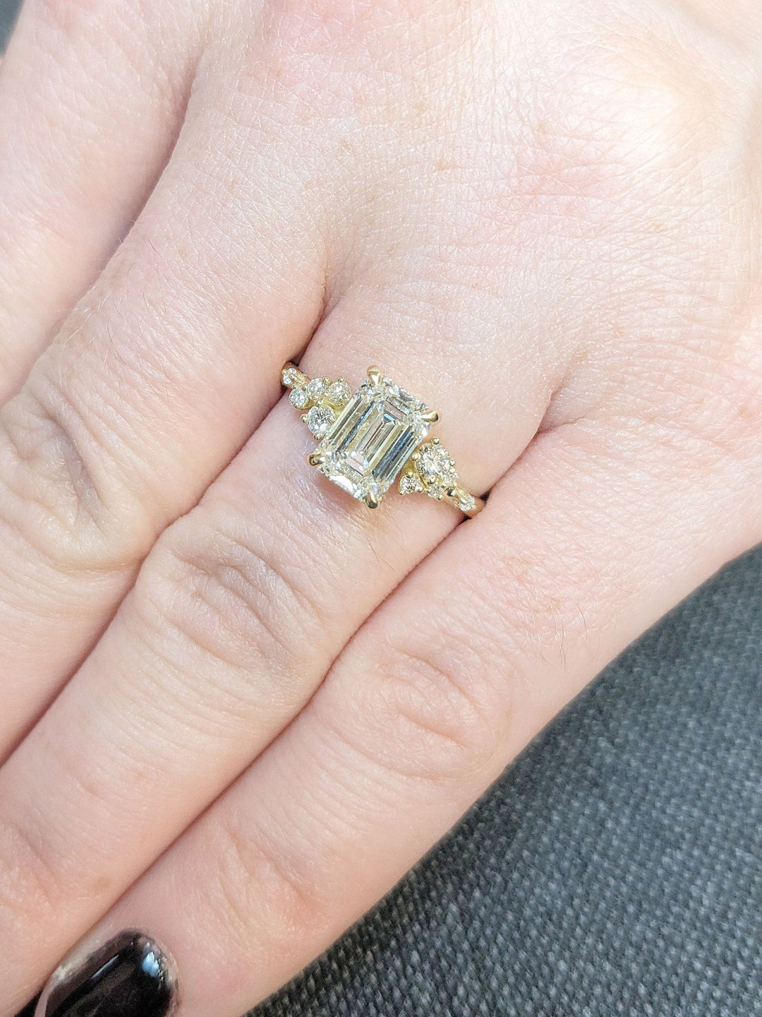 Premium emerald cut cluster engagement ring crafted in solid gold
