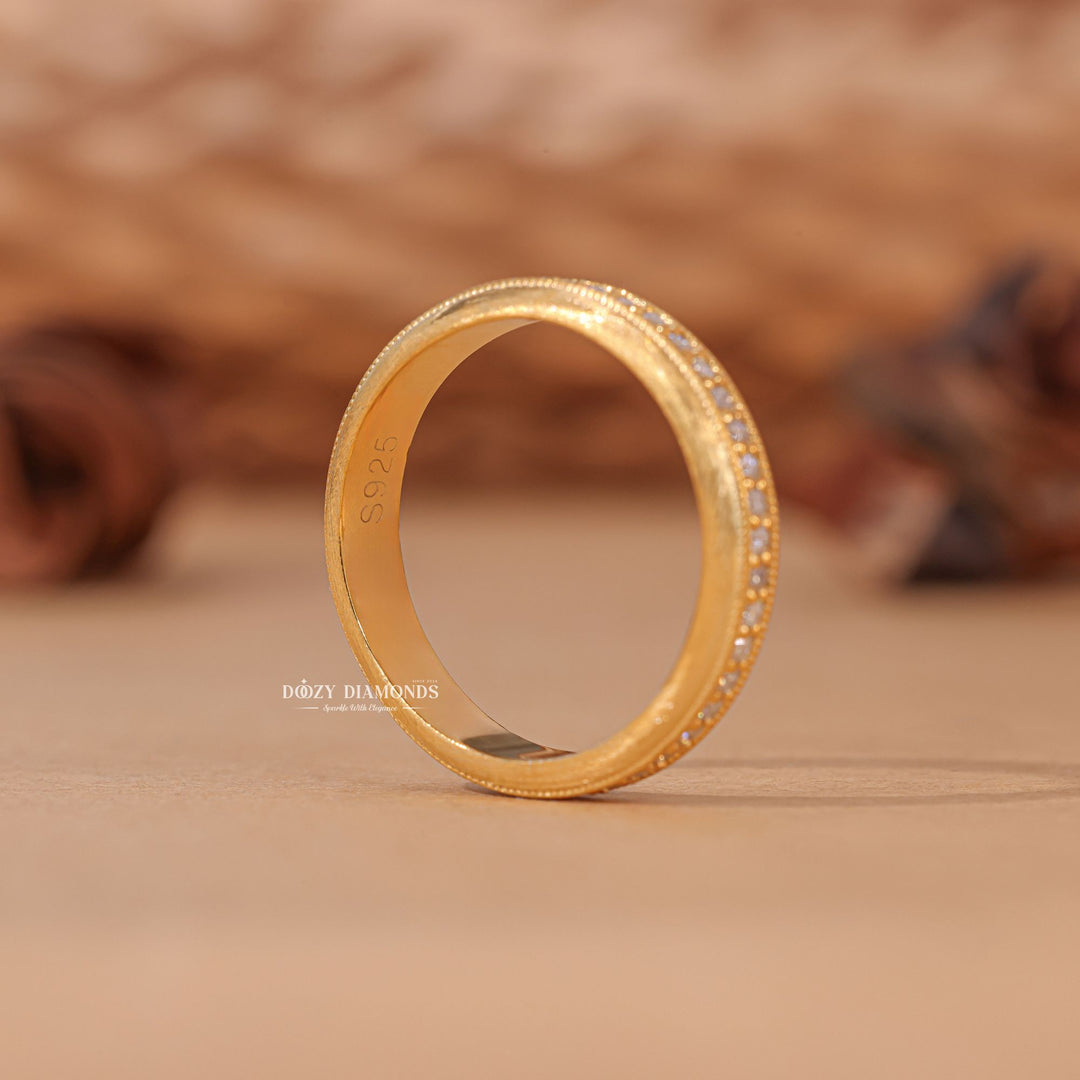 Round diamond band stacked with engagement ring