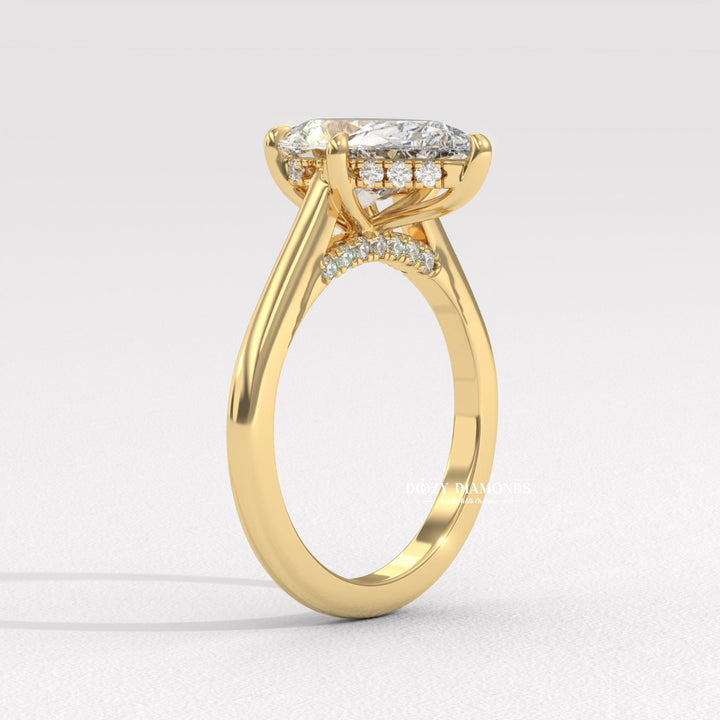 Pear solitaire engagement ring with IGI certificate and packaging