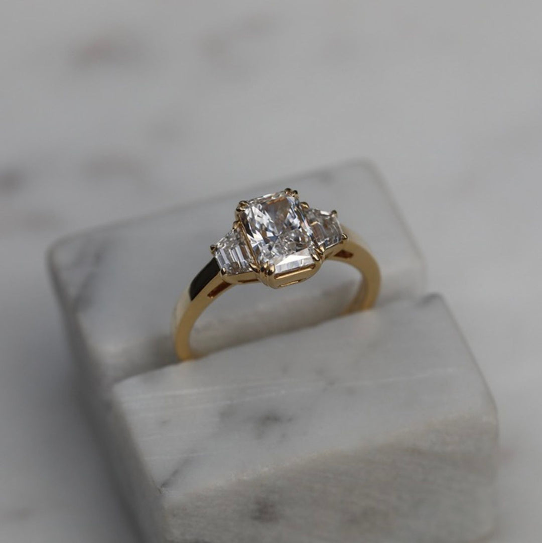 Radiant cut solitaire engagement ring with IGI certified center diamond