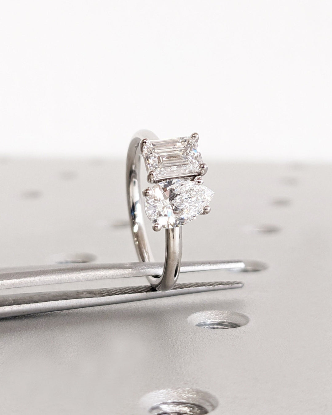 Side angle of pear solitaire diamond engagement ring