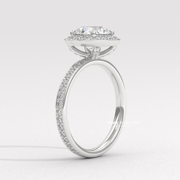 Round halo engagement ring close-up showing high clarity diamond clarity