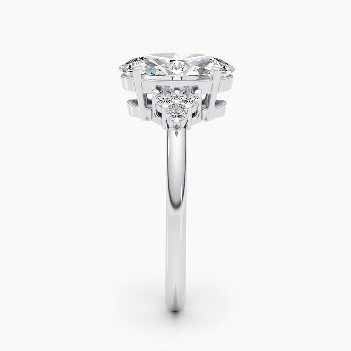 Oval cluster engagement ring close-up highlighting diamond sparkle