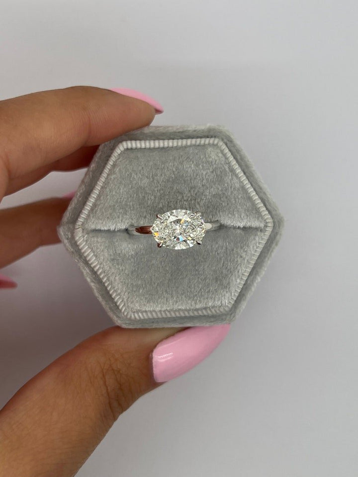 Profile view of oval cut solitaire engagement ring band