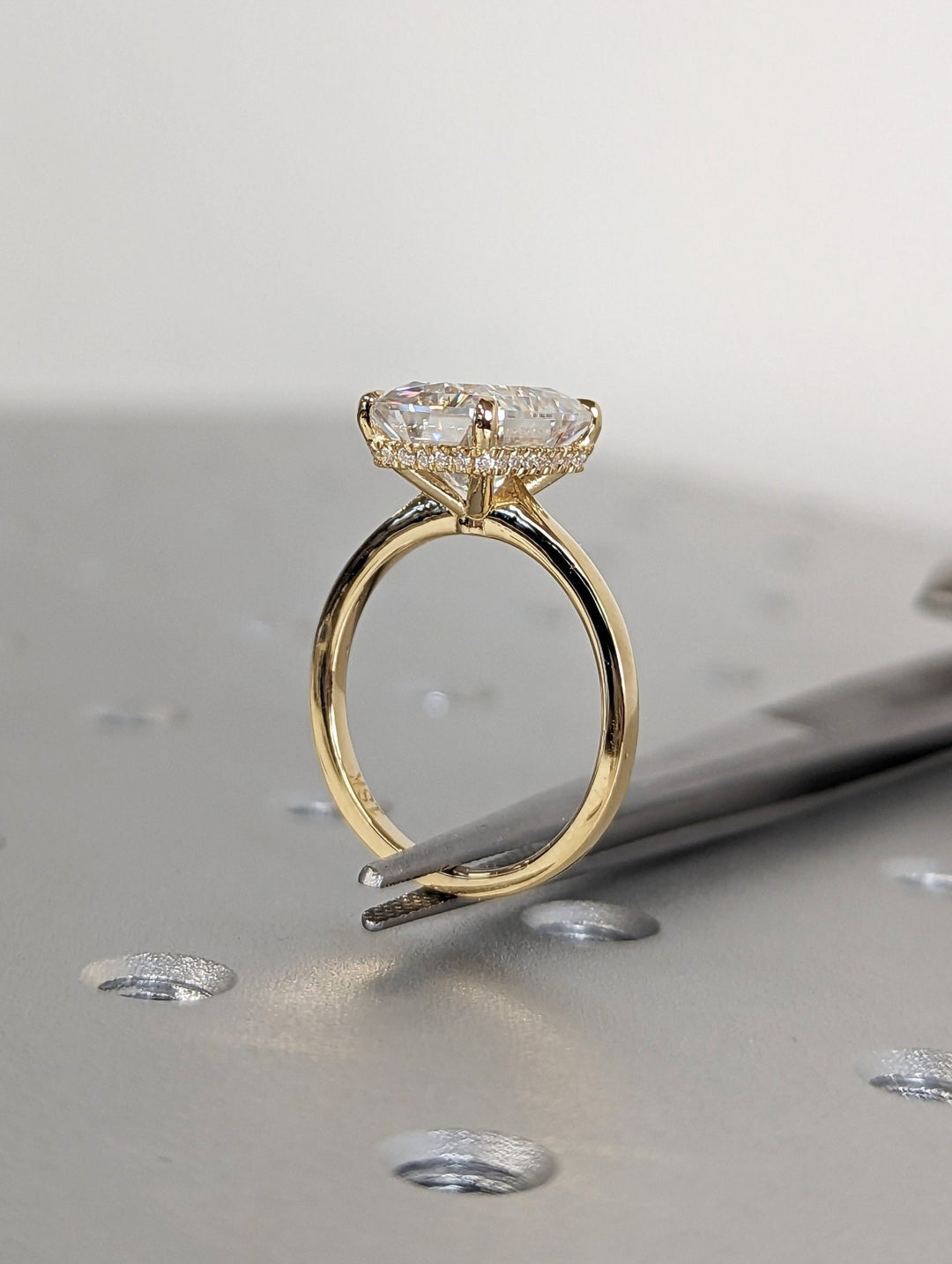 Premium radiant cut hidden halo engagement ring crafted in solid gold
