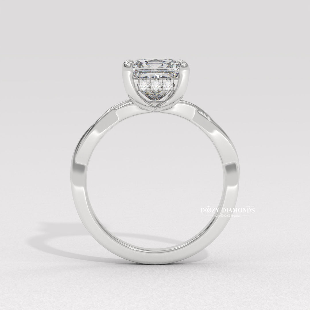 Princess solitaire engagement ring viewed from the side