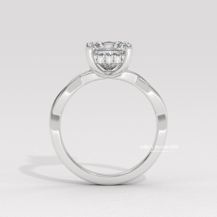 Princess solitaire engagement ring viewed from the side
