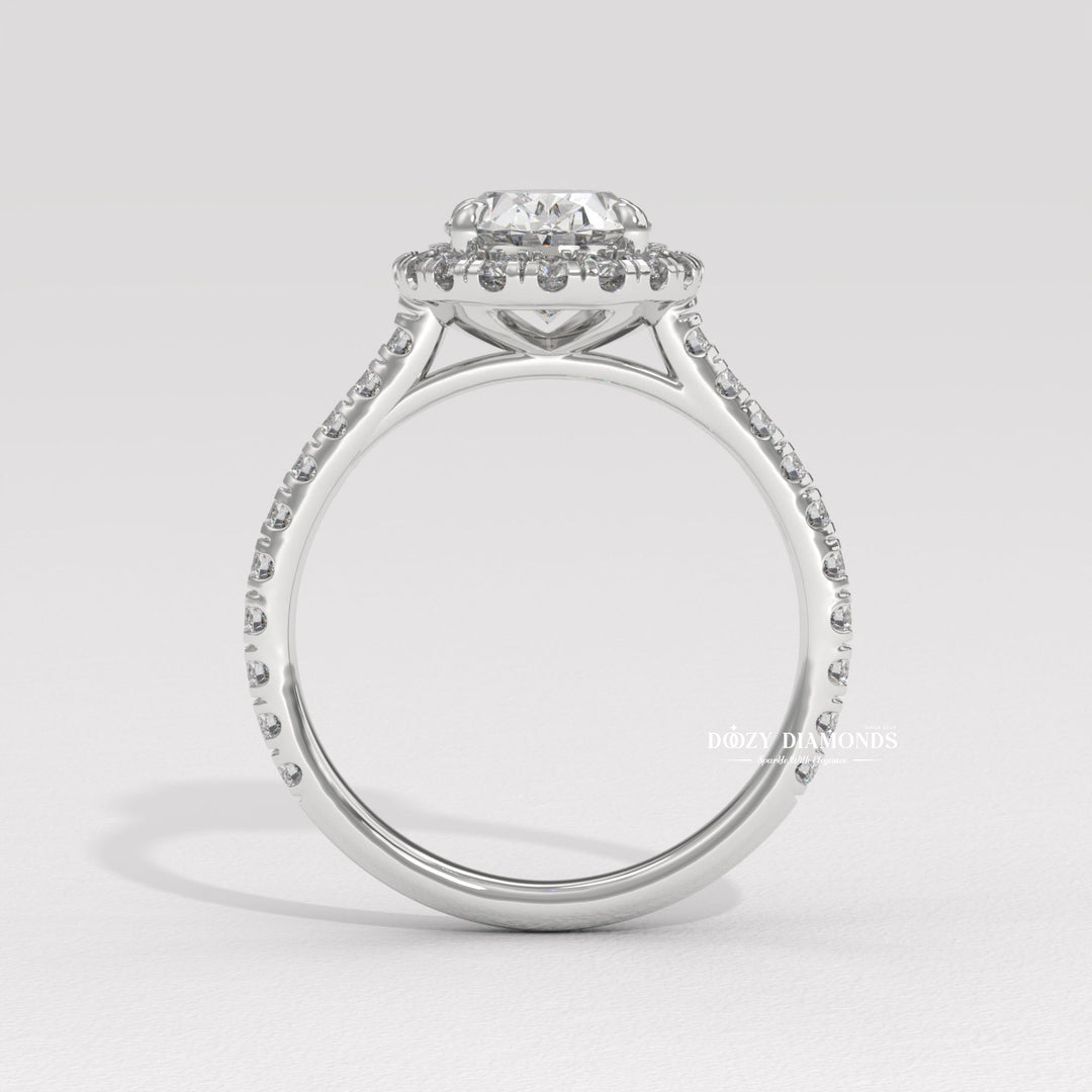 IGI certified oval cut diamond in halo engagement ring setting