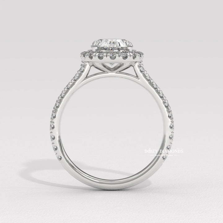 IGI certified oval cut diamond in halo engagement ring setting
