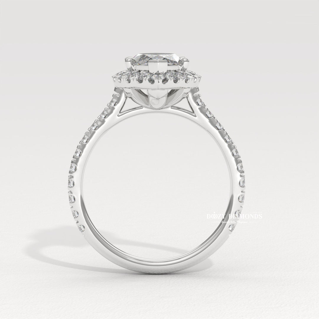 Close-up of marquise cut center diamond in solitaire engagement ring