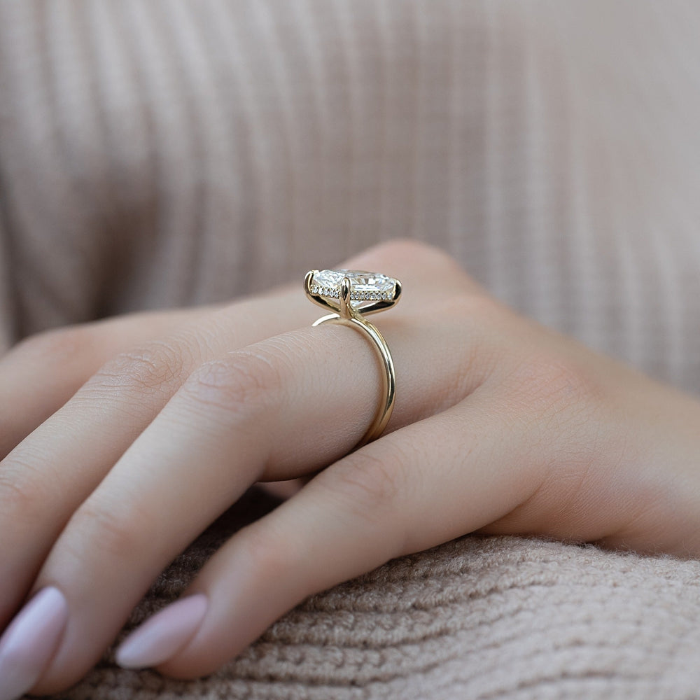 Certified radiant cut diamond featured in hidden halo engagement ring