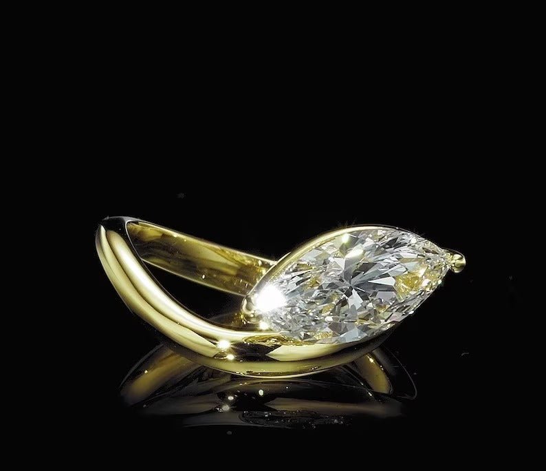 Certified marquise cut diamond featured in solitaire engagement ring