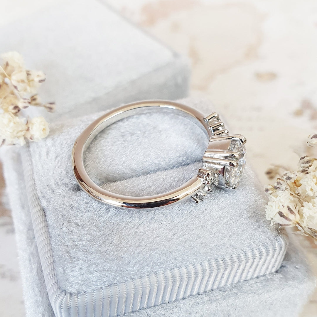 Premium round cut cluster engagement ring crafted in solid gold