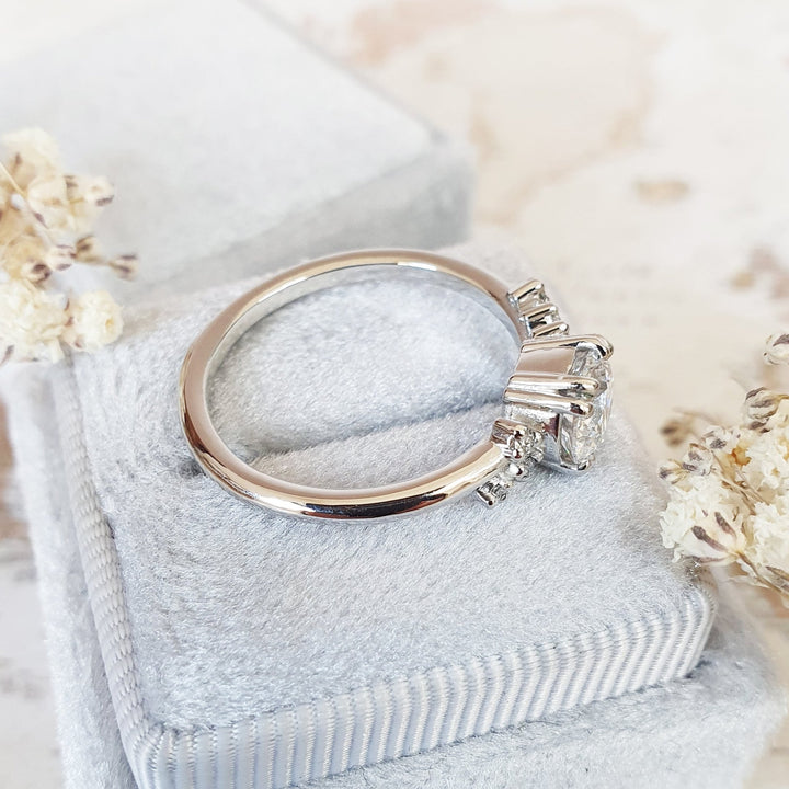 Premium round cut cluster engagement ring crafted in solid gold