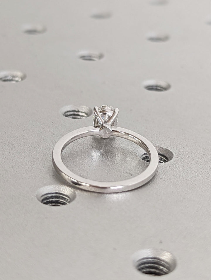 Oval solitaire engagement ring close-up showing high clarity diamond clarity