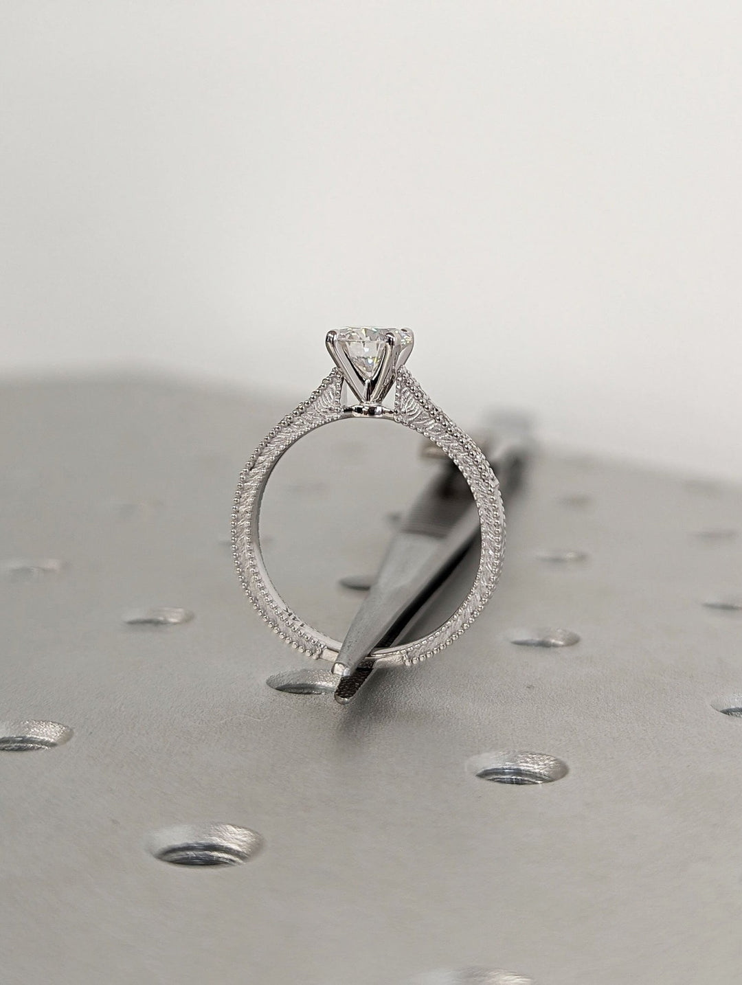 Round vintage diamond ring presented in signature gift packaging