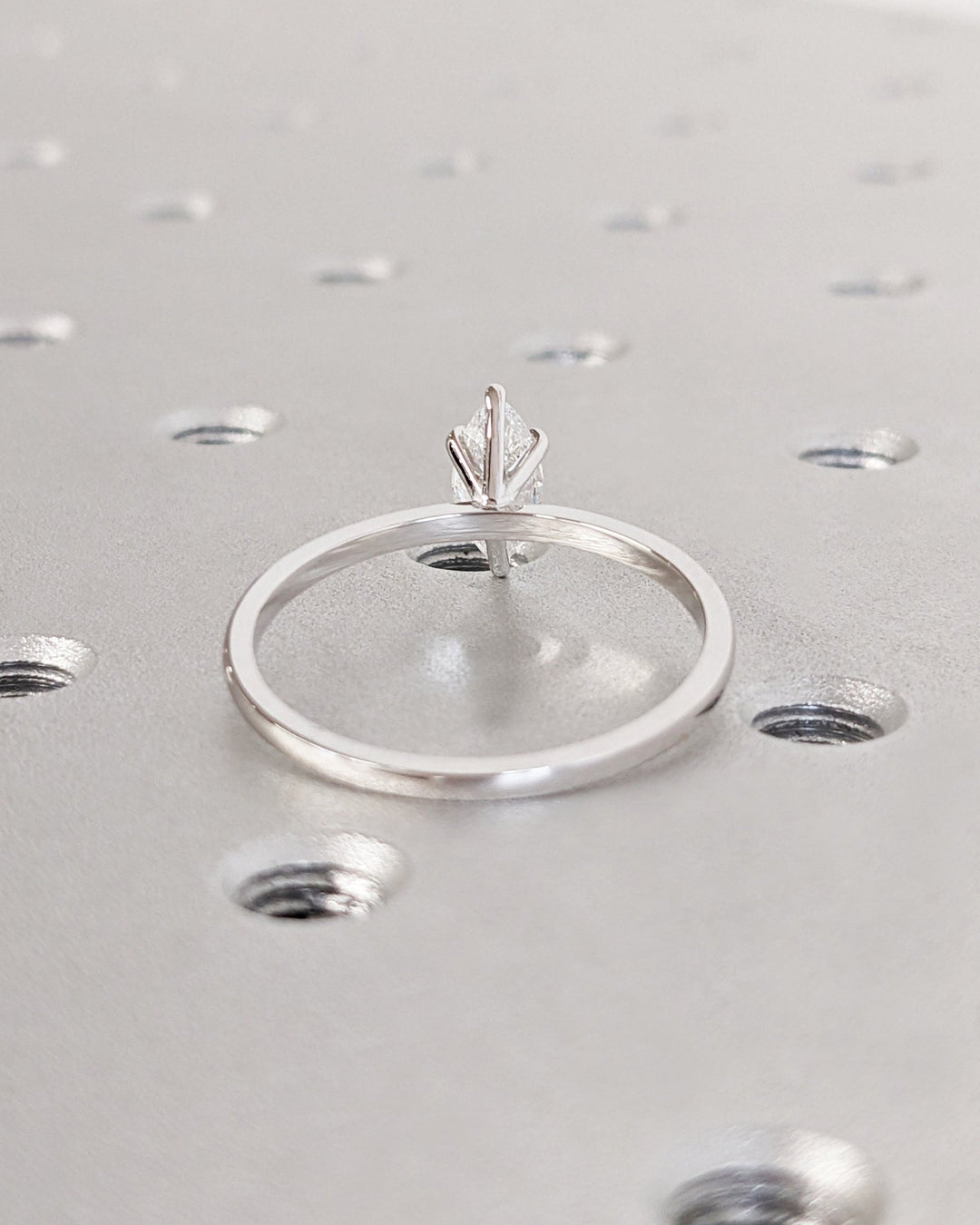 Marquise solitaire lab grown diamond ring fitted on finger