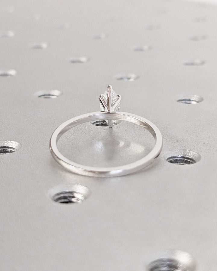 Marquise solitaire lab grown diamond ring fitted on finger