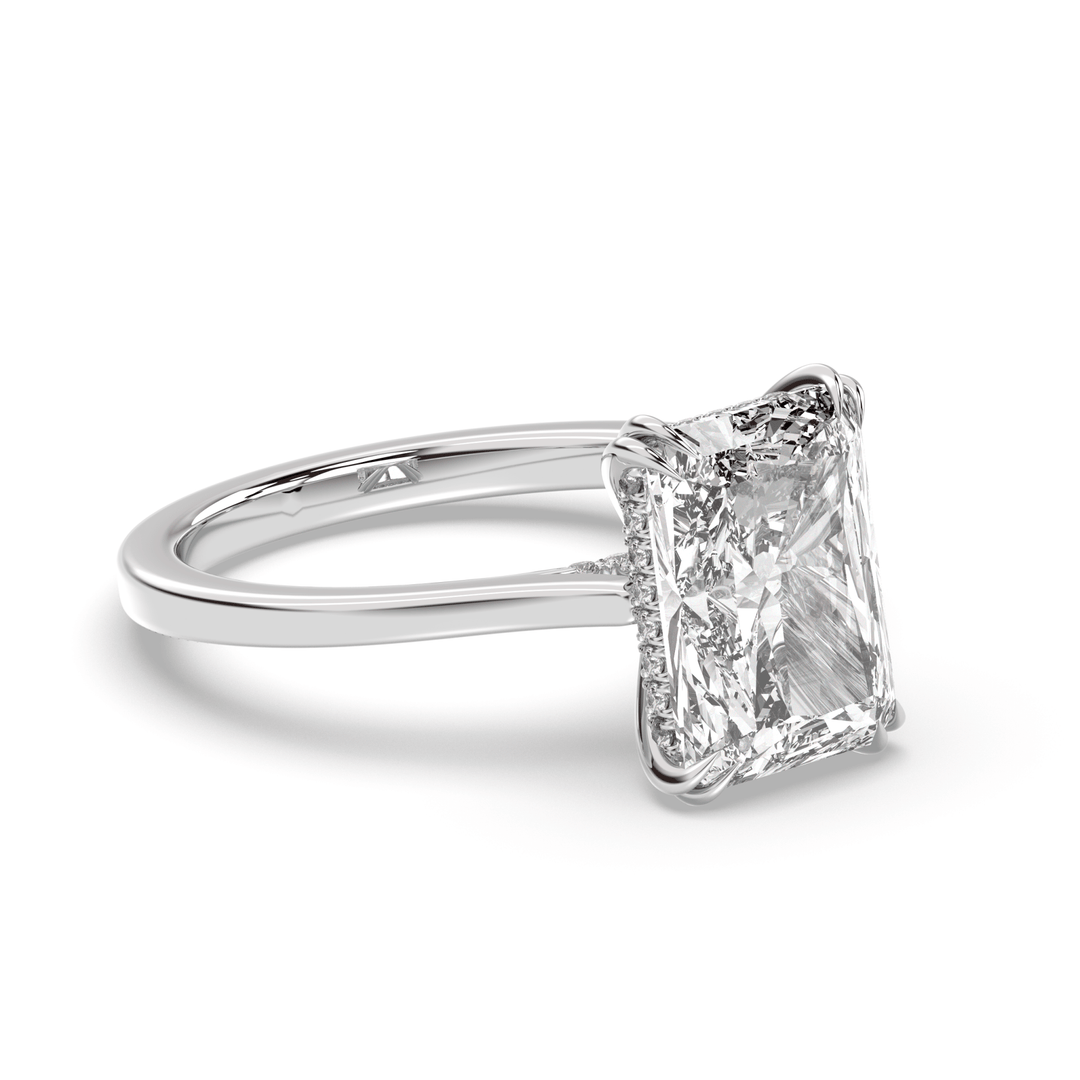 Certified radiant cut diamond featured in hidden halo engagement ring