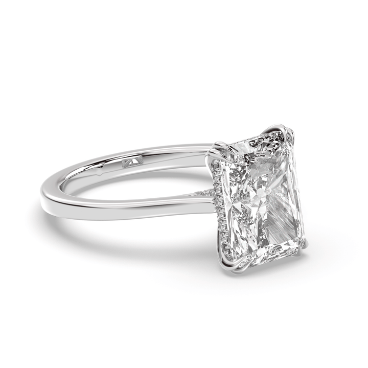 Certified radiant cut diamond featured in hidden halo engagement ring