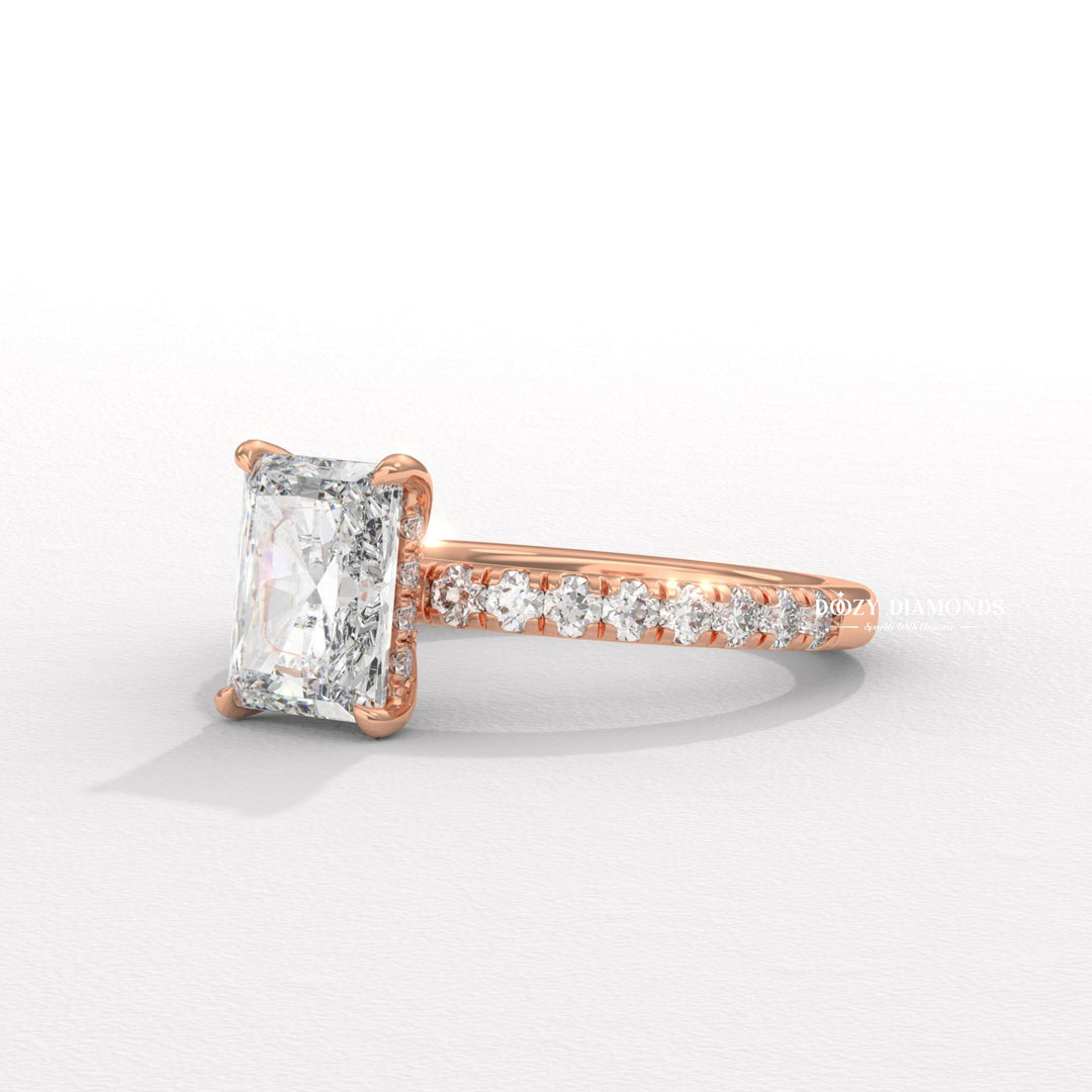Radiant solitaire engagement ring photographed in natural light