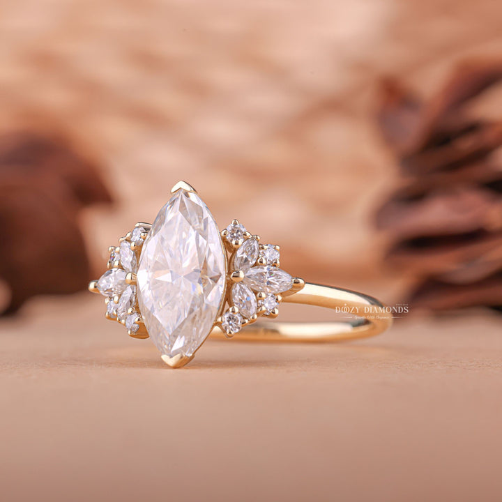 Marquise cut cluster engagement ring shown in real-life wear