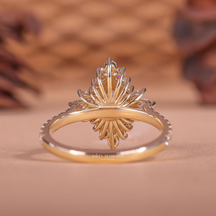 Marquise cut cluster engagement ring shown in real-life wear