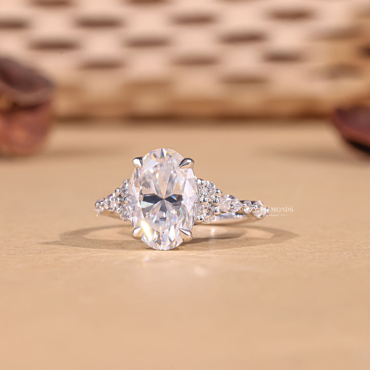 Oval cluster lab grown diamond ring side profile in gold setting