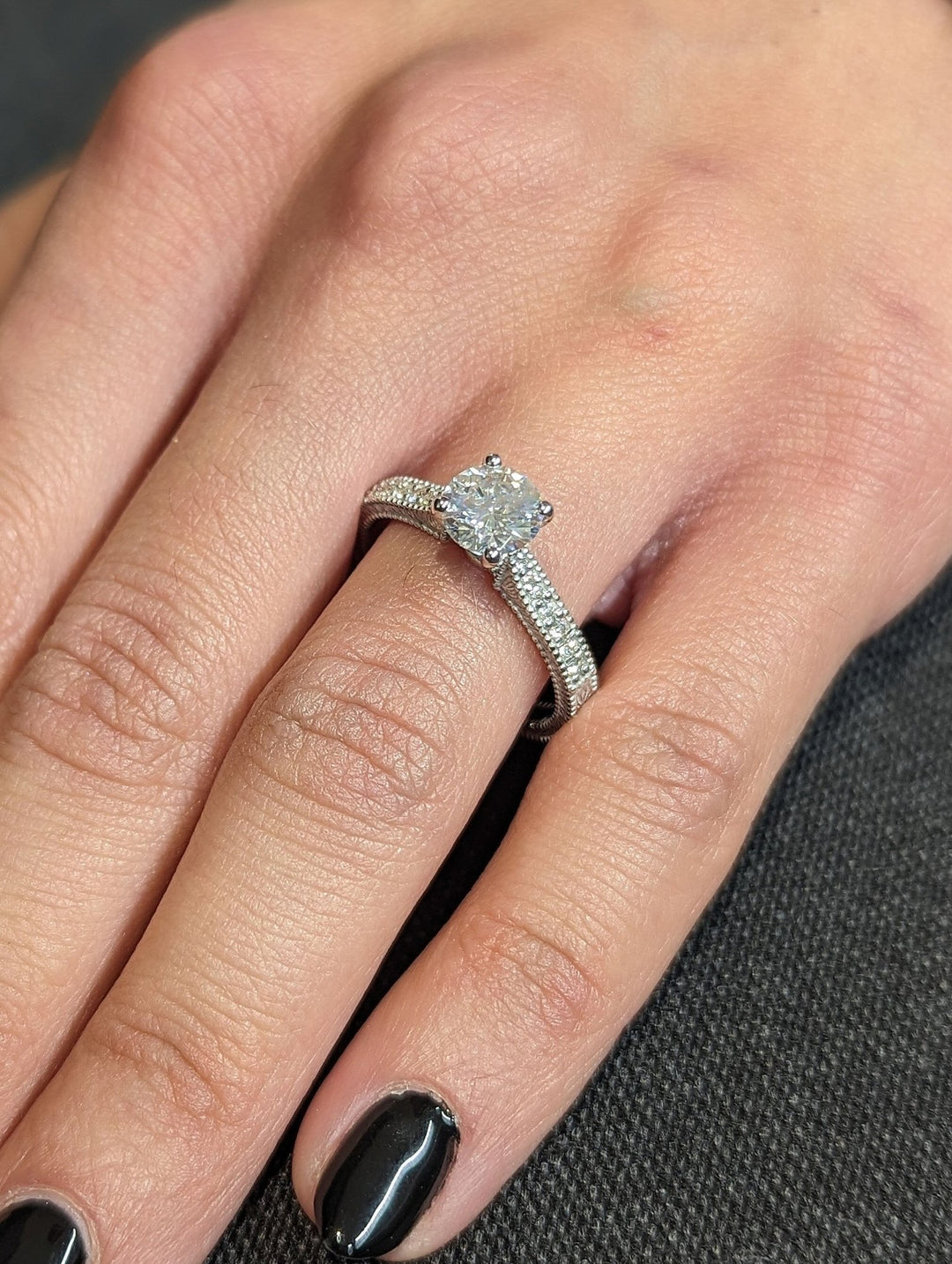 Round vintage engagement ring offered in gold and platinum