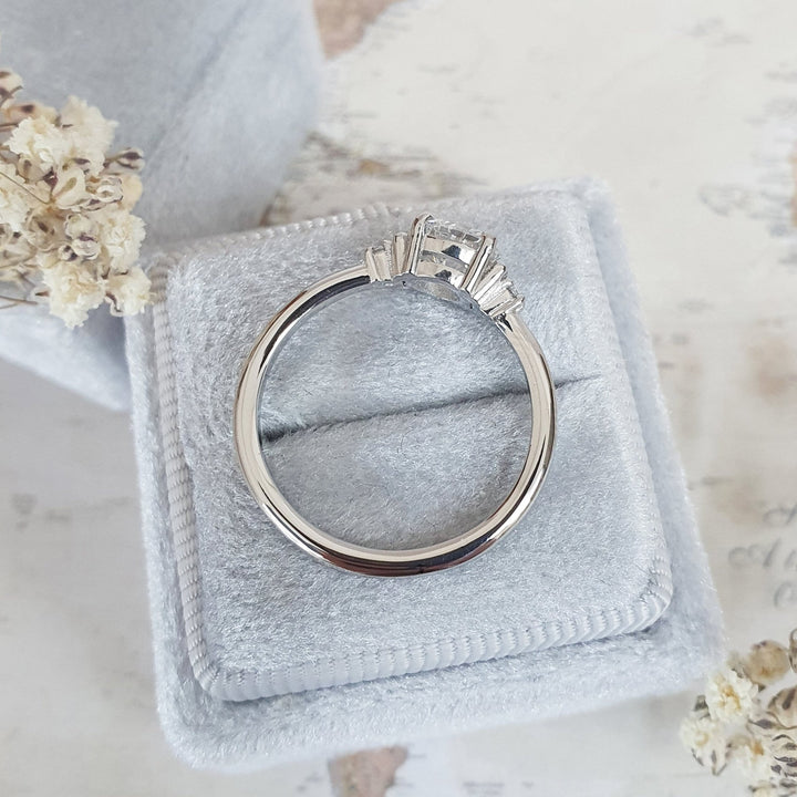 Round cut diamond ring worn on hand