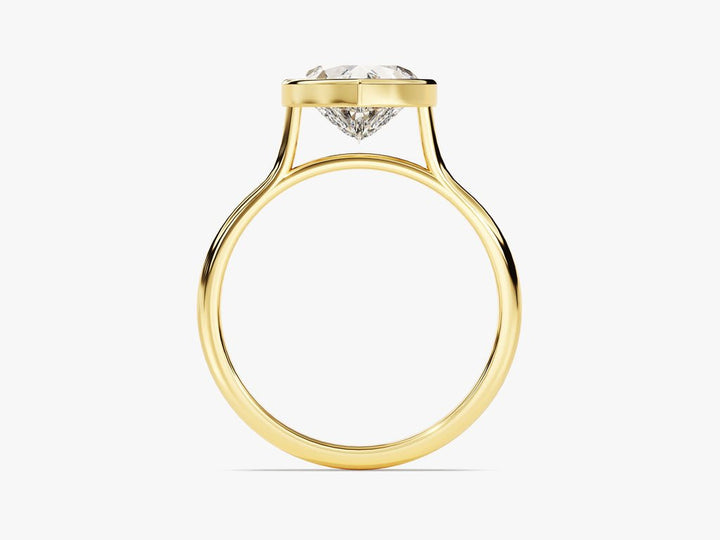 Angled view of heart cut diamond in bezel setting