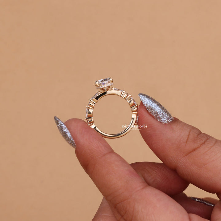 Macro shot of oval cut diamond facets in hidden halo ring setting