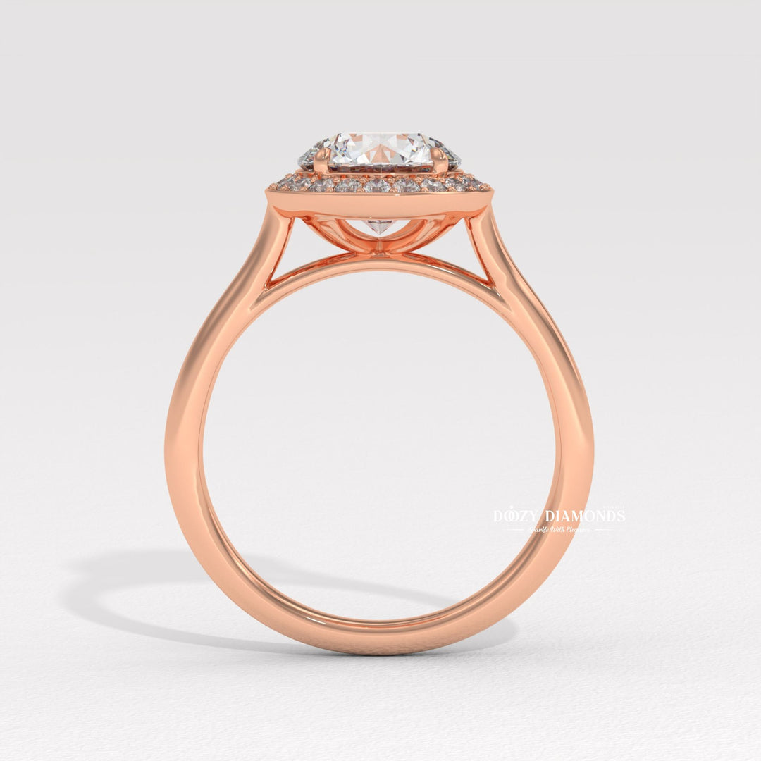 Round halo engagement ring photographed in natural light