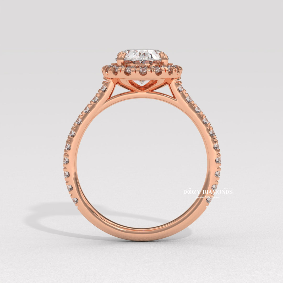 Oval cut halo engagement ring shown in real-life wear