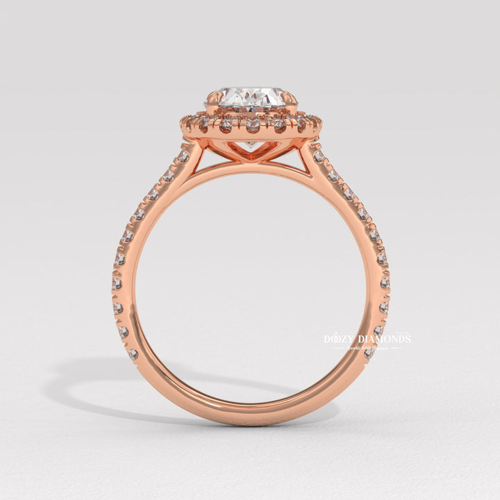 Oval cut halo engagement ring shown in real-life wear