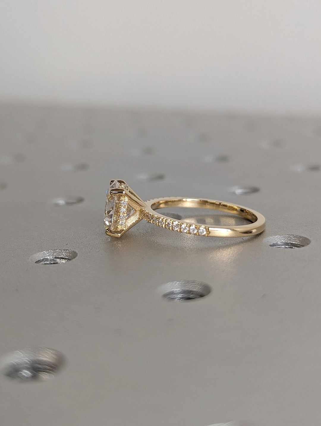 Classic round hidden halo engagement ring crafted for everyday wear