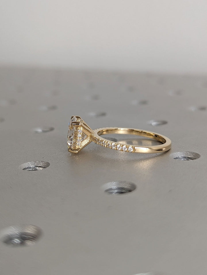 Classic round hidden halo engagement ring crafted for everyday wear