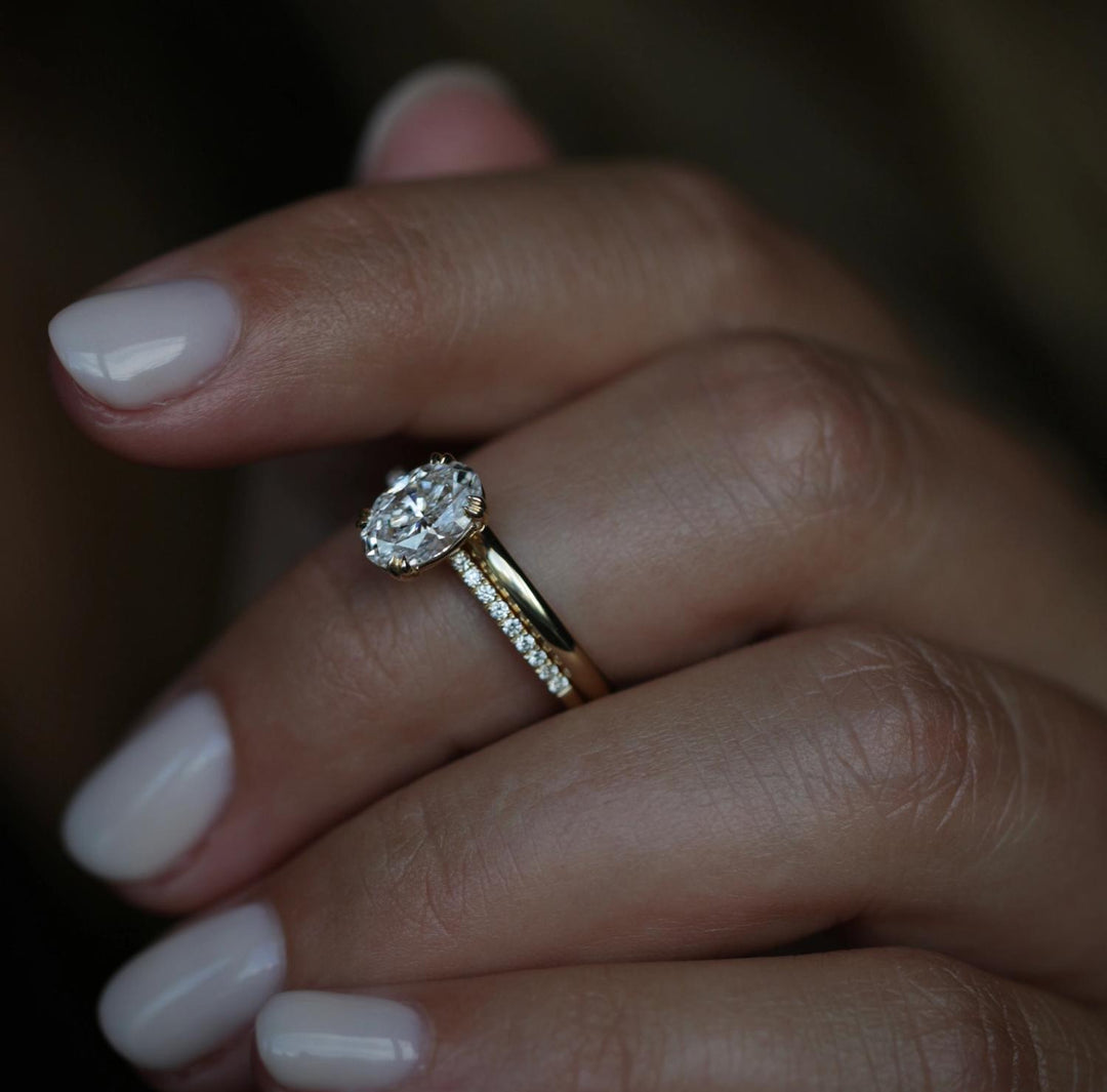 Certified oval cut diamond featured in solitaire engagement ring