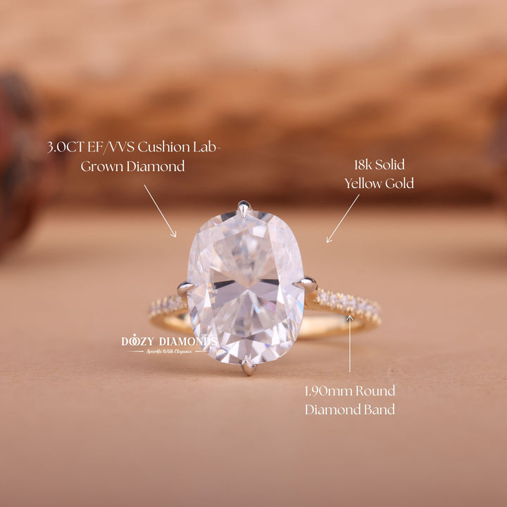 Cushion cut diamond ring worn on hand