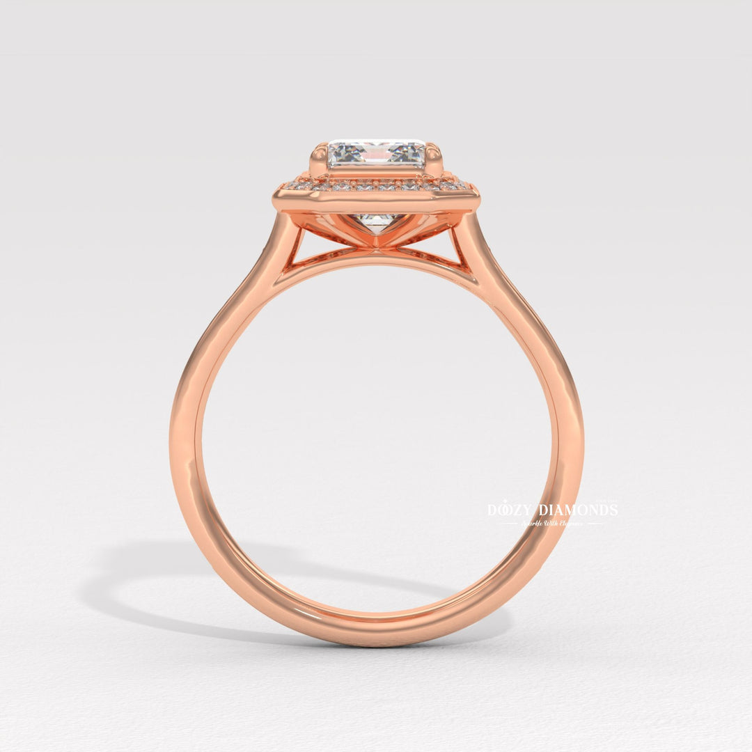 Emerald cut halo engagement ring shown in real-life wear