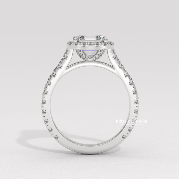 Asscher cut engagement ring shown with authenticity certificate