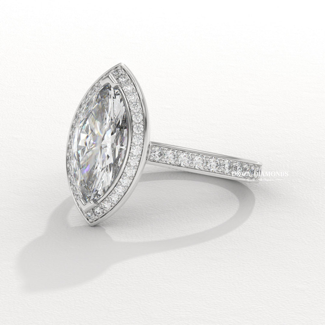 Marquise halo diamond ring displayed on jewelry stand