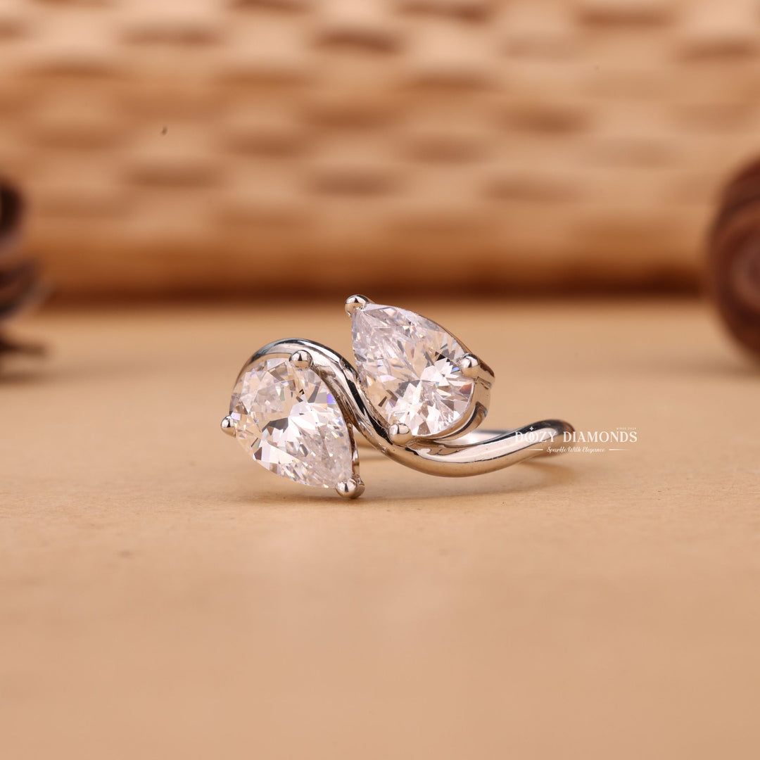 Detailed close-up of pear solitaire diamond engagement ring